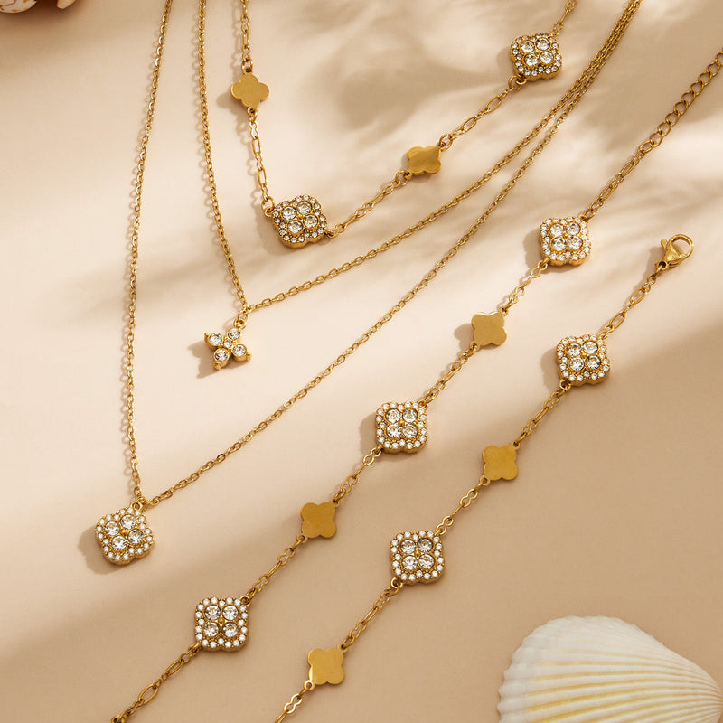 Zaria layered gold necklace with star and floral charm, 316L stainless steel — Crown Crest Jewel