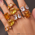 Solenne gold ring with a vibrant orange rectangular stone, 316L stainless steel — Crown Crest Jewel