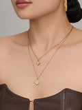 Zaria layered gold necklace with star and floral charm, 316L stainless steel — Crown Crest Jewel