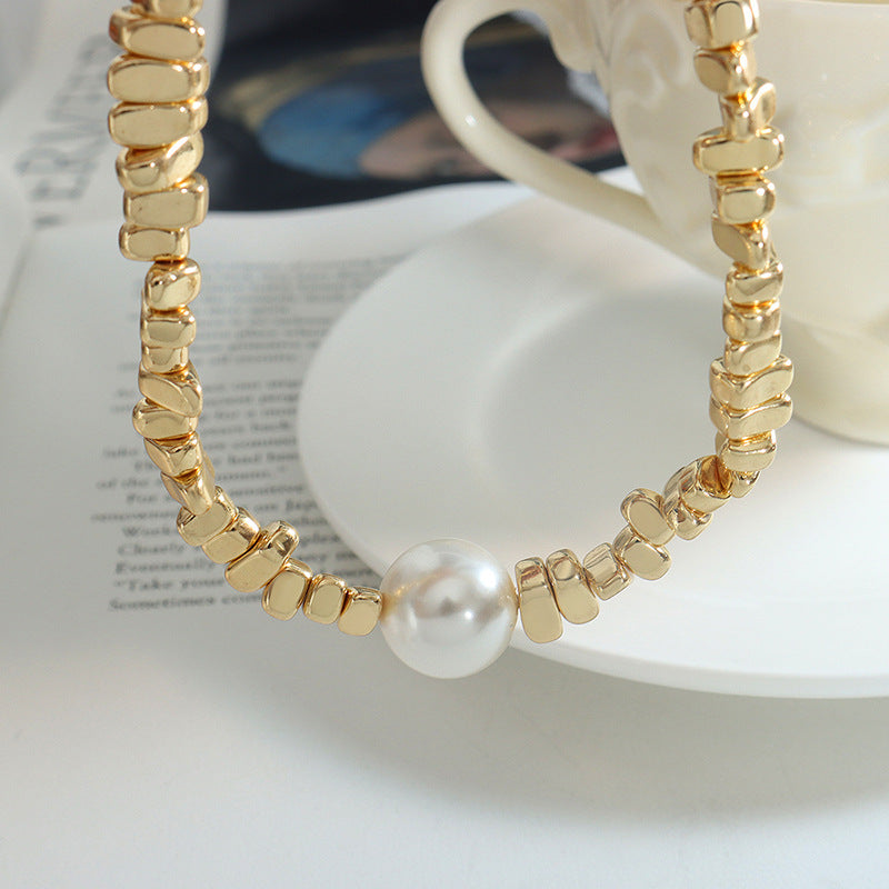 Taji bold gold beaded necklace with a luminous pearl, 316L stainless steel — Crown Crest Jewel
