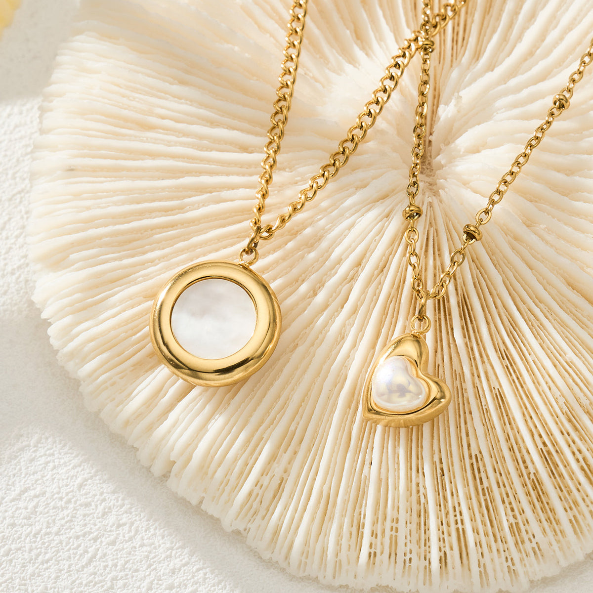Nia gold necklace with a circular pendant framing a white stone, 316L stainless steel — Crown Crest Jewel