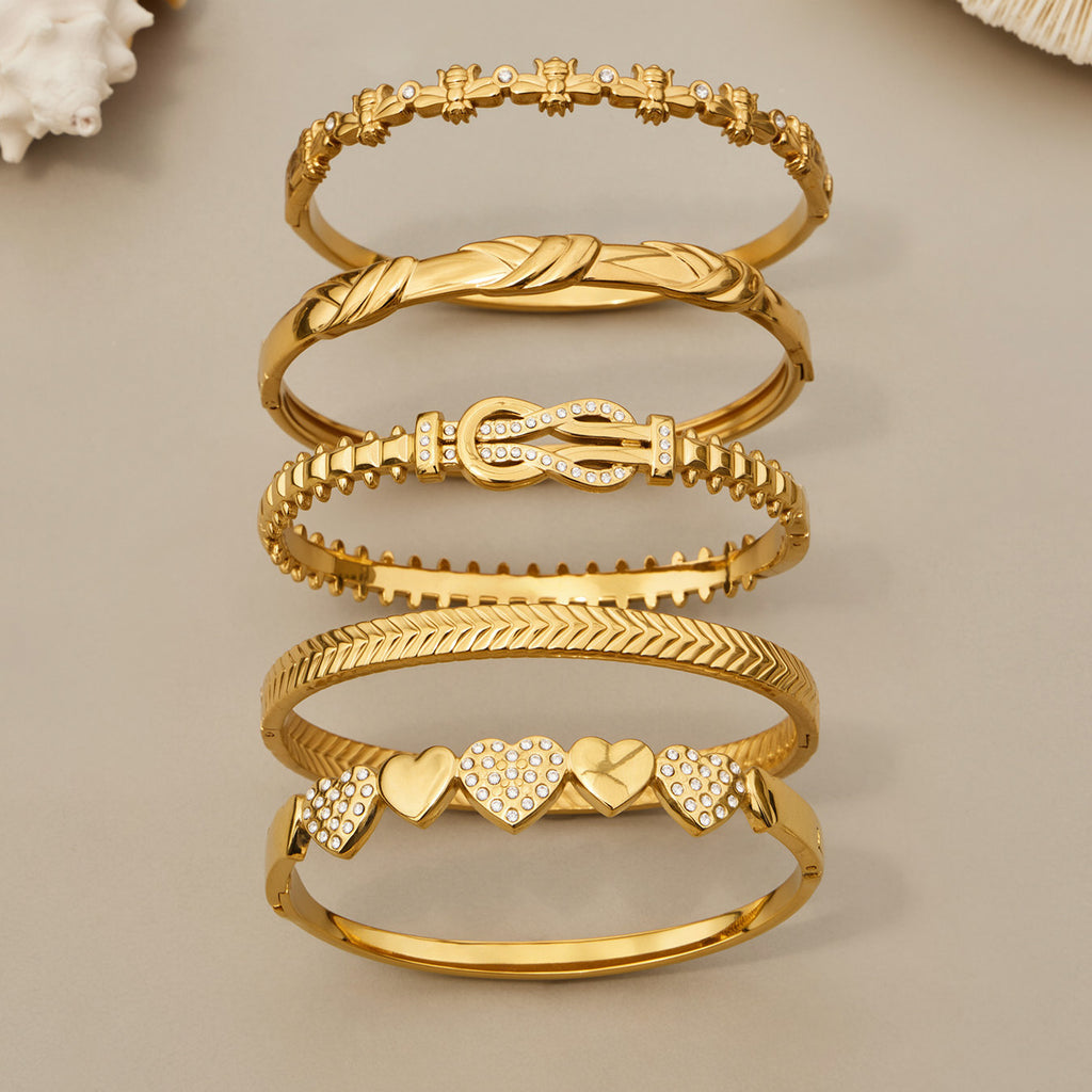 Aste slender gold bangle with sculptural stone detail, 316L stainless steel — Crown Crest Jewel