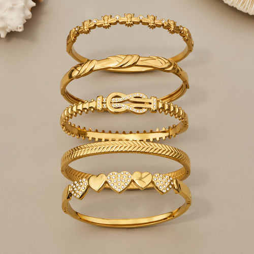 Aste slender gold bangle with sculptural stone detail, 316L stainless steel — Crown Crest Jewel