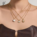 Lulu necklace with a soft blue cloud-brushed pendant, 316L stainless steel — Crown Crest Jewel