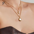 Amora gold necklace with a pearl nestled in a heart, 316L stainless steel — Crown Crest Jewel
