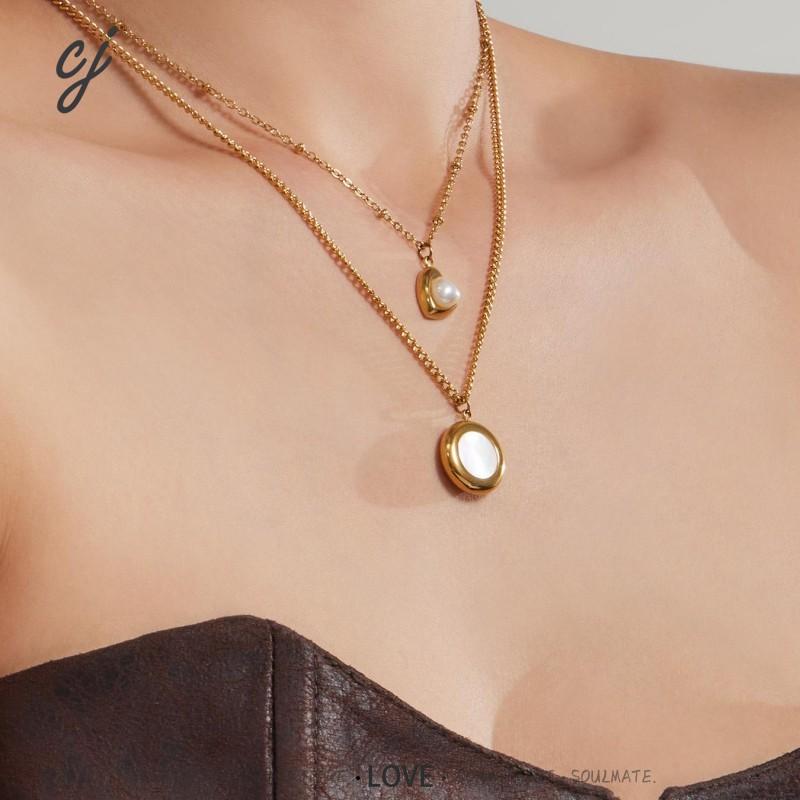 Amora gold necklace with a pearl nestled in a heart, 316L stainless steel — Crown Crest Jewel