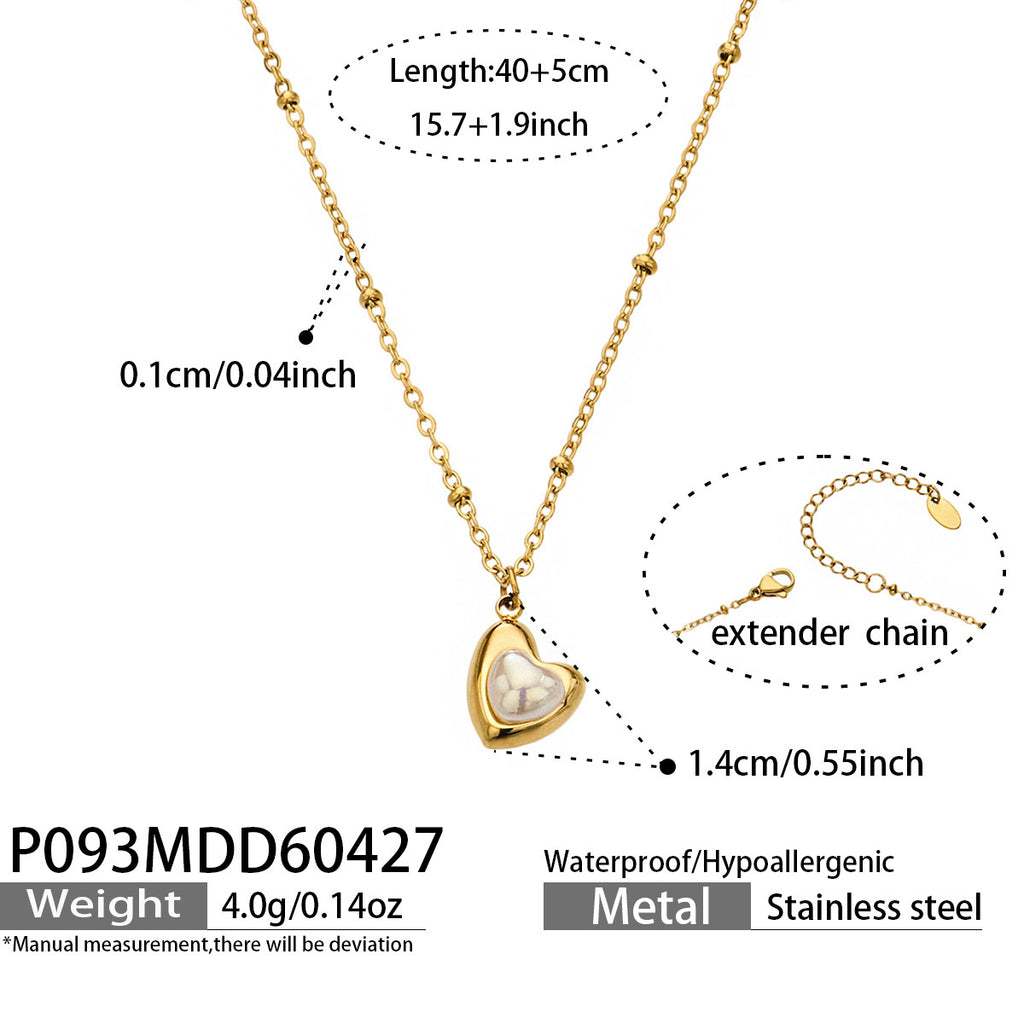 Amora gold necklace with a pearl nestled in a heart, 316L stainless steel — Crown Crest Jewel