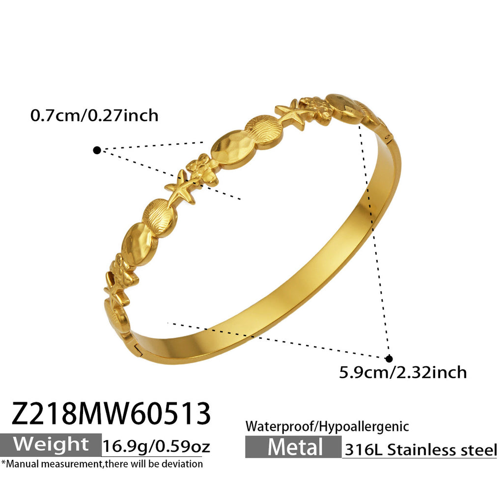 Astra gold bangle with circle, star and oval details, 316L stainless steel — Crown Crest Jewel