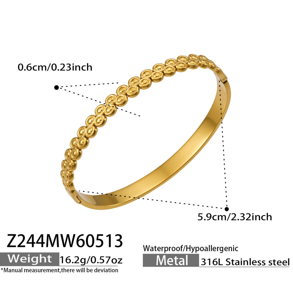 Halo sculptural gold bangle of interlocking circles, 316L stainless steel — Crown Crest Jewel