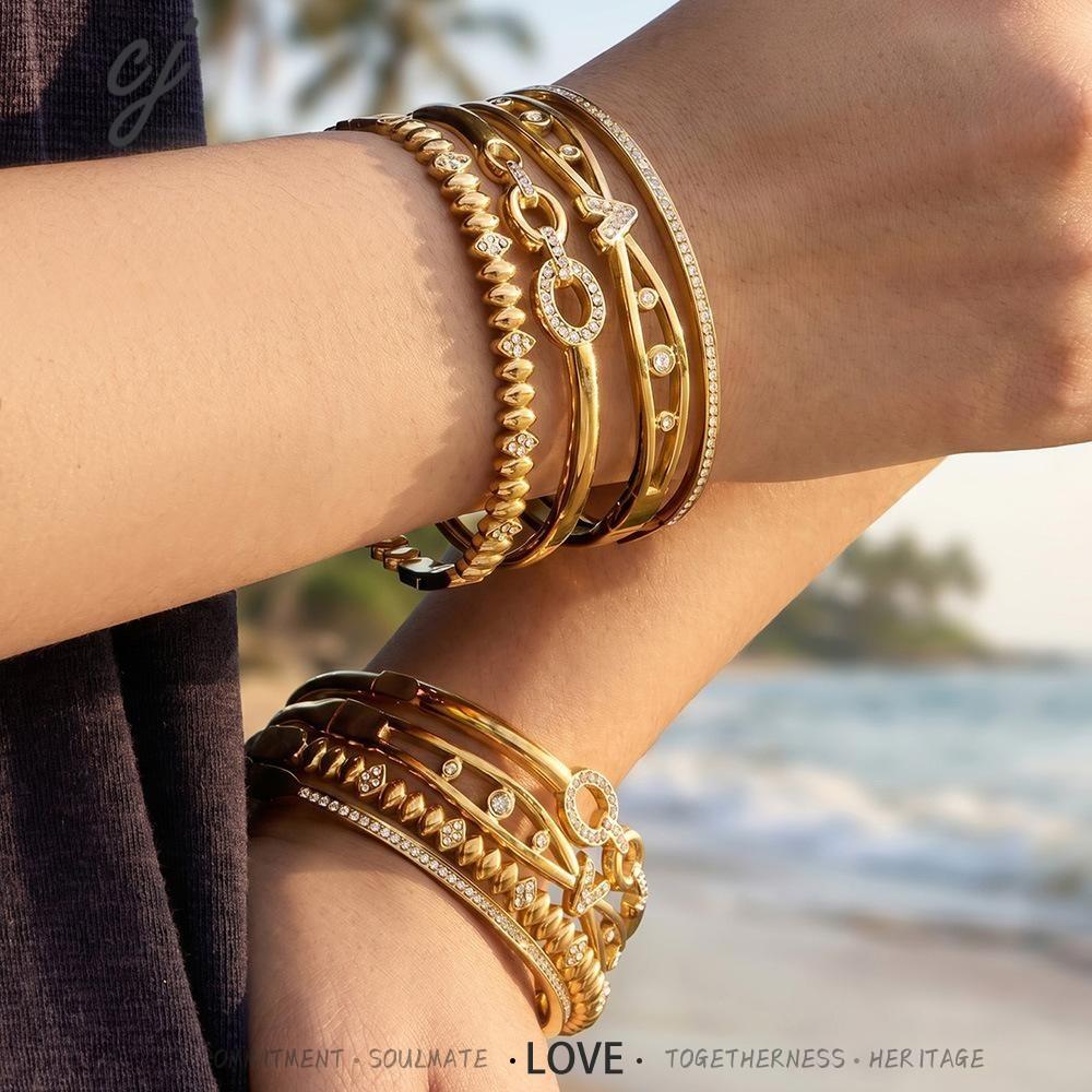 Milele gold bangle lined with brilliant stones, 316L stainless steel — Crown Crest Jewel